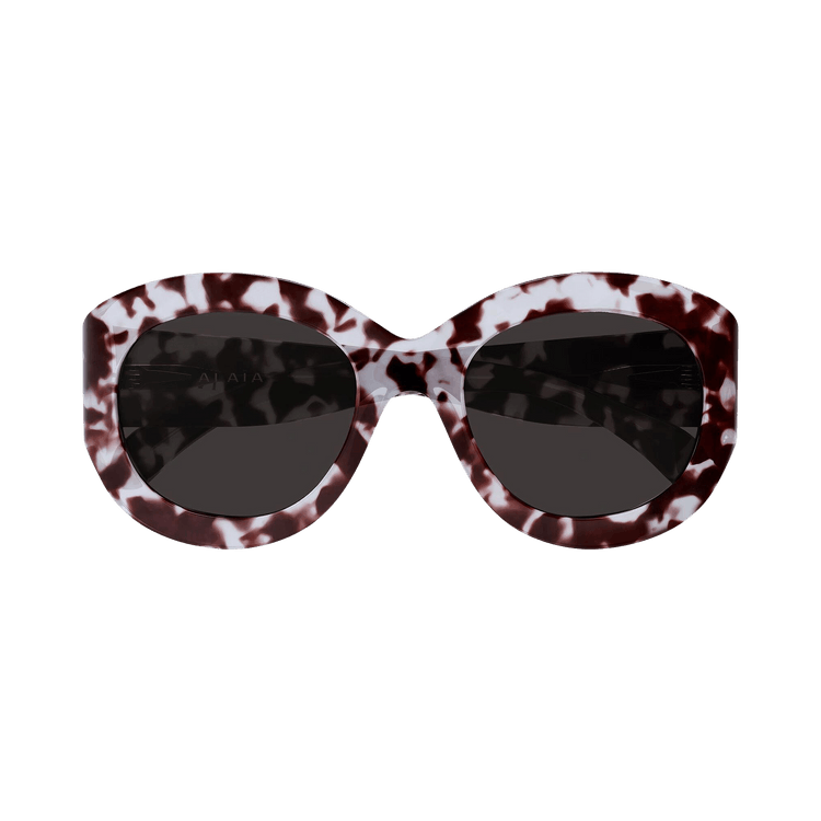 Alaïa Oval Sunglasses — Brown